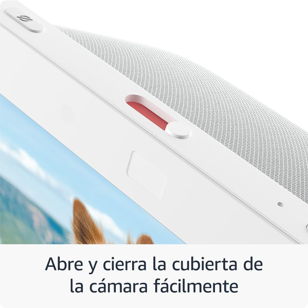 Primer plano de un altavoz blanco, texto: 'Abre y cierra la cubierta de la cámara fácilmente'.