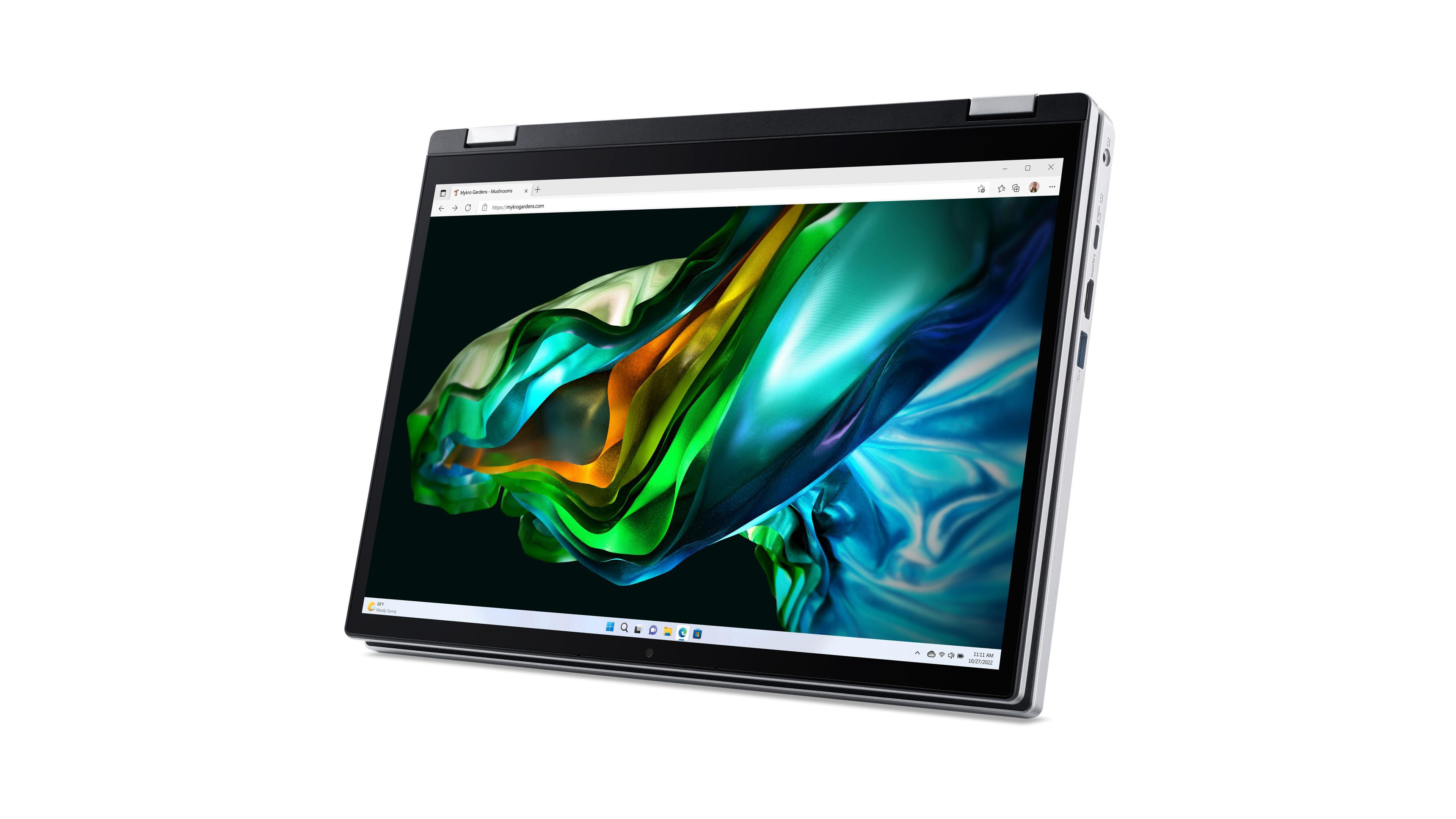 Laptop mit Website-Anzeige, geöffnet auf weißer Oberfläche, mit weißem Hintergrund.