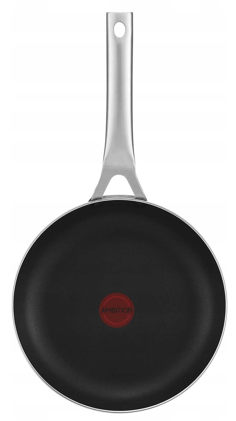 Czarna patelnia ze srebrnym uchwytem i czerwonym środkiem, na białym tle.
