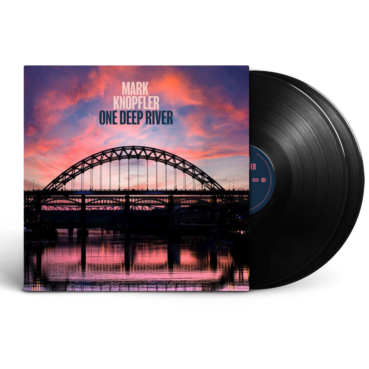 Schallplattenhülle mit Brücke über Wasser bei Sonnenuntergang, daneben zwei schwarze Schallplatten.