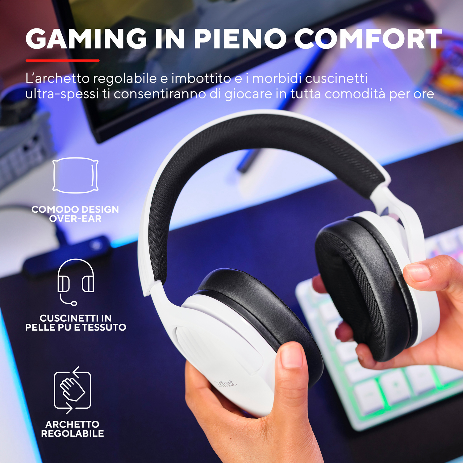 Cuffie da gioco bianche e nere con padiglioni auricolari ampi e archetto comodo. Testo: Gaming in comfort.