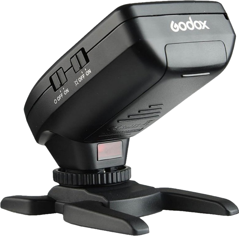 Flash Godox noir avec pied et interrupteurs.