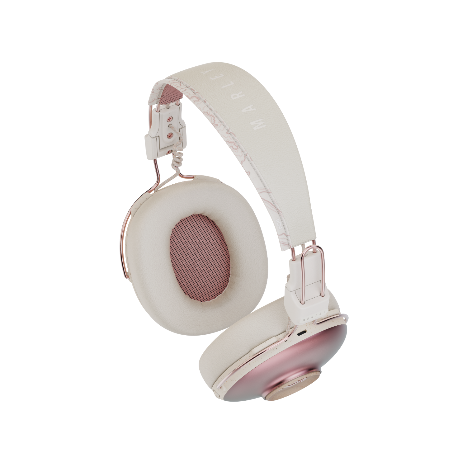 Crème en roségouden Marley-koptelefoon. Witte hoofdband met Marley-tekst.