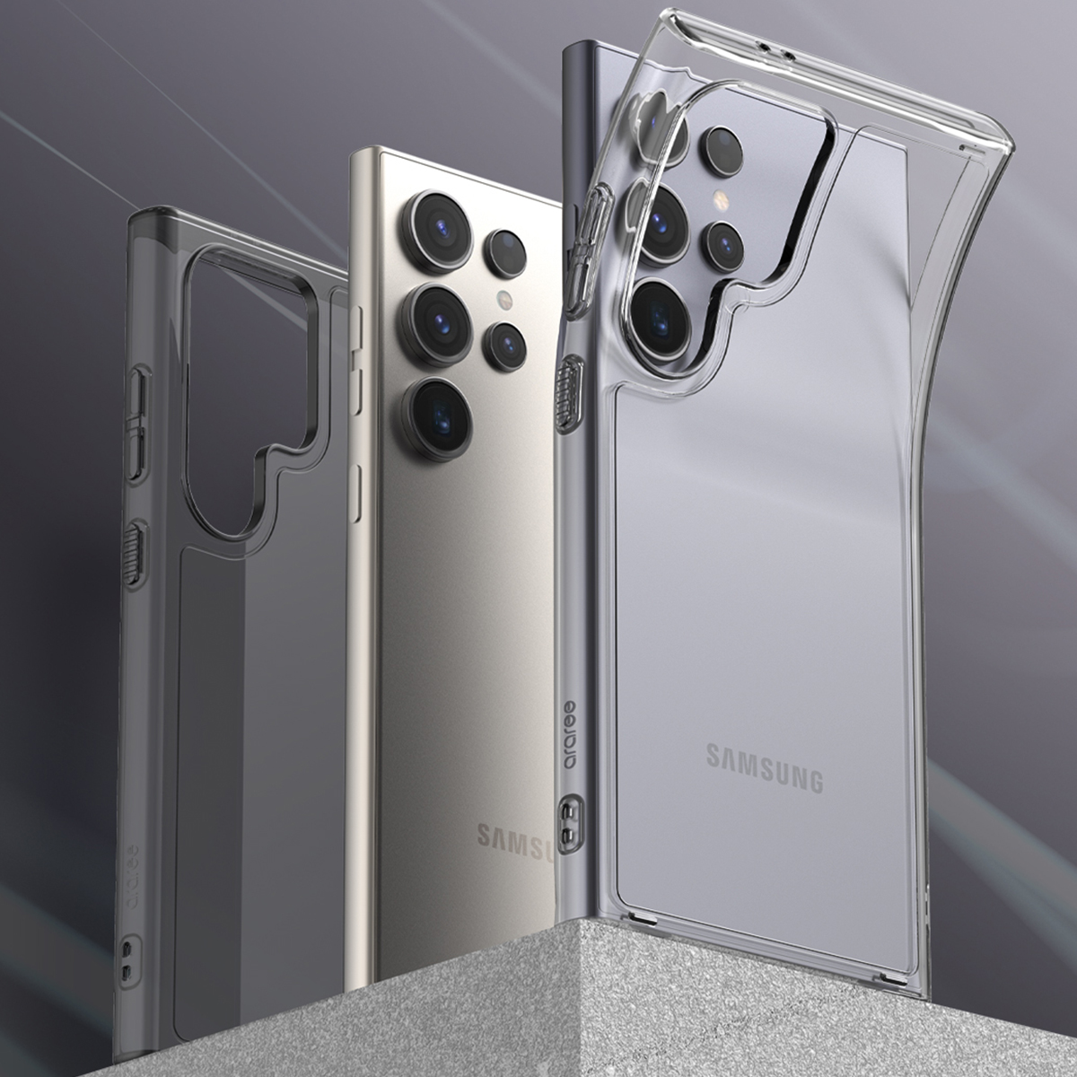 Trzy etui na telefon. Dwa są przezroczyste, jedno szare. Etykieta Samsung widoczna na dwóch.