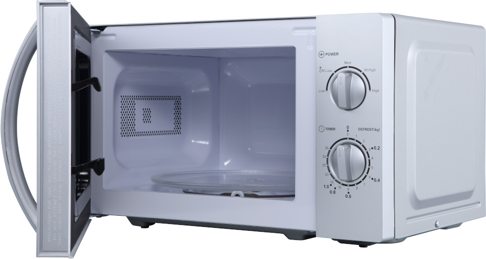 White microwave with open door, glass plate inside, control panel on the right.