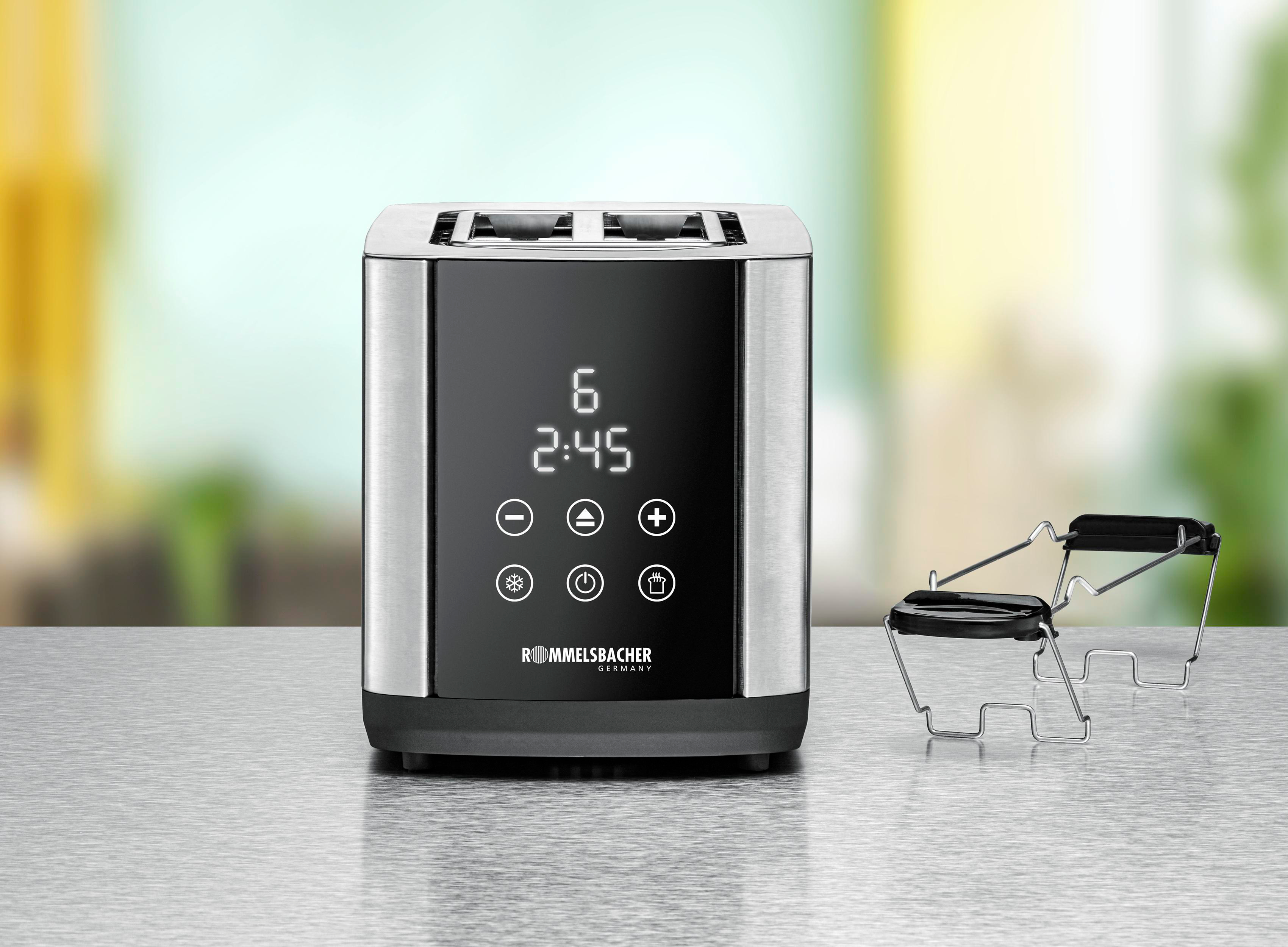 Silber-schwarzer Toaster mit Digitalanzeige für Zeit und Einstellungen. Inkl. Brötchenaufsatz.