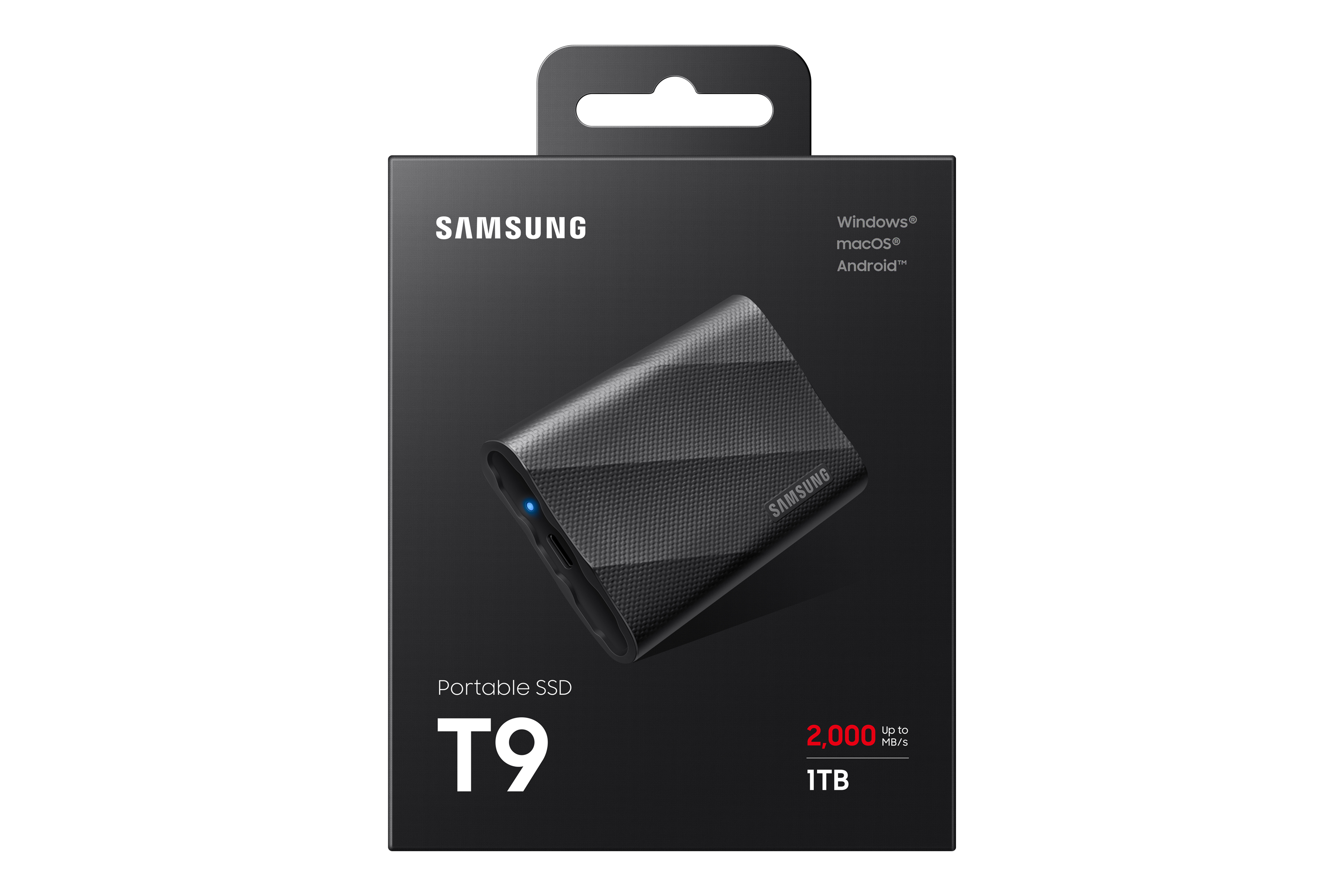 SSD portátil Samsung negra en caja. Fondo blanco. Caja muestra unidad, texto y marca.
