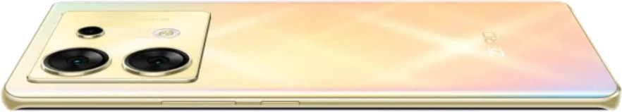 Złoty smartfon leży na boku. Widoczne są dwa duże obiektywy aparatu. Tył telefonu ma kolor gradientu.