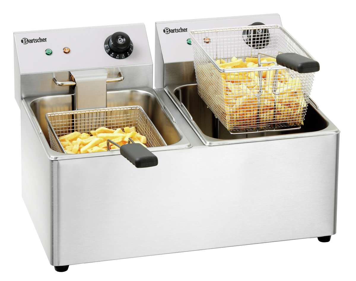 Doppelte Edelstahl-Fritteuse mit Pommes Frites in Körben.