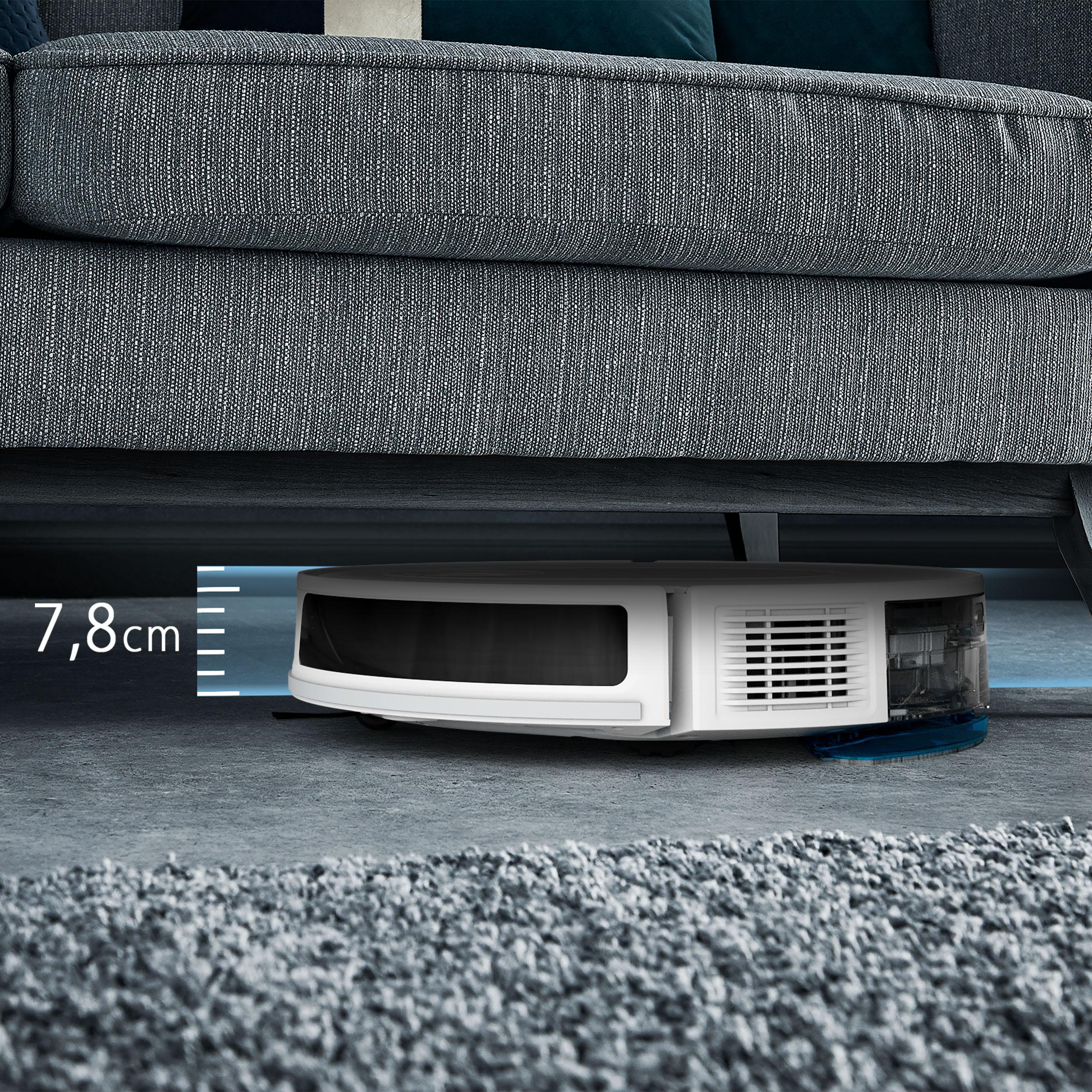 Ein weißer Roboter-Staubsauger unter einem grauen Sofa auf einem grauen Teppich. Der Abstand beträgt 7,8 cm.