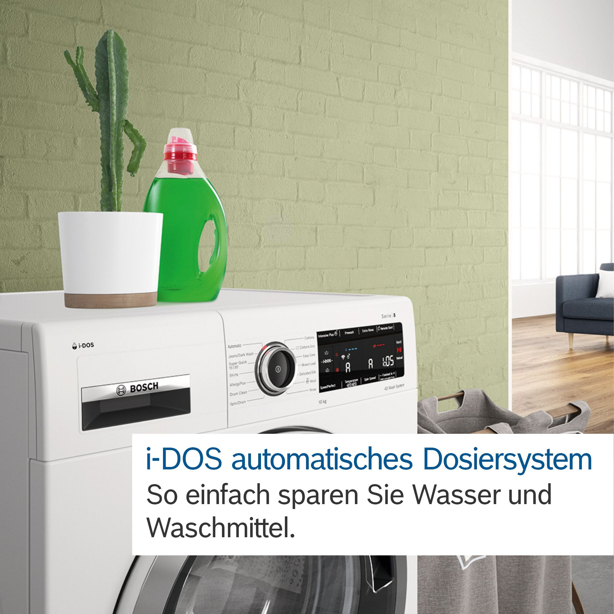Un lave-linge avec le texte 'i-DOS automatische Dosiersystem' et un cactus.