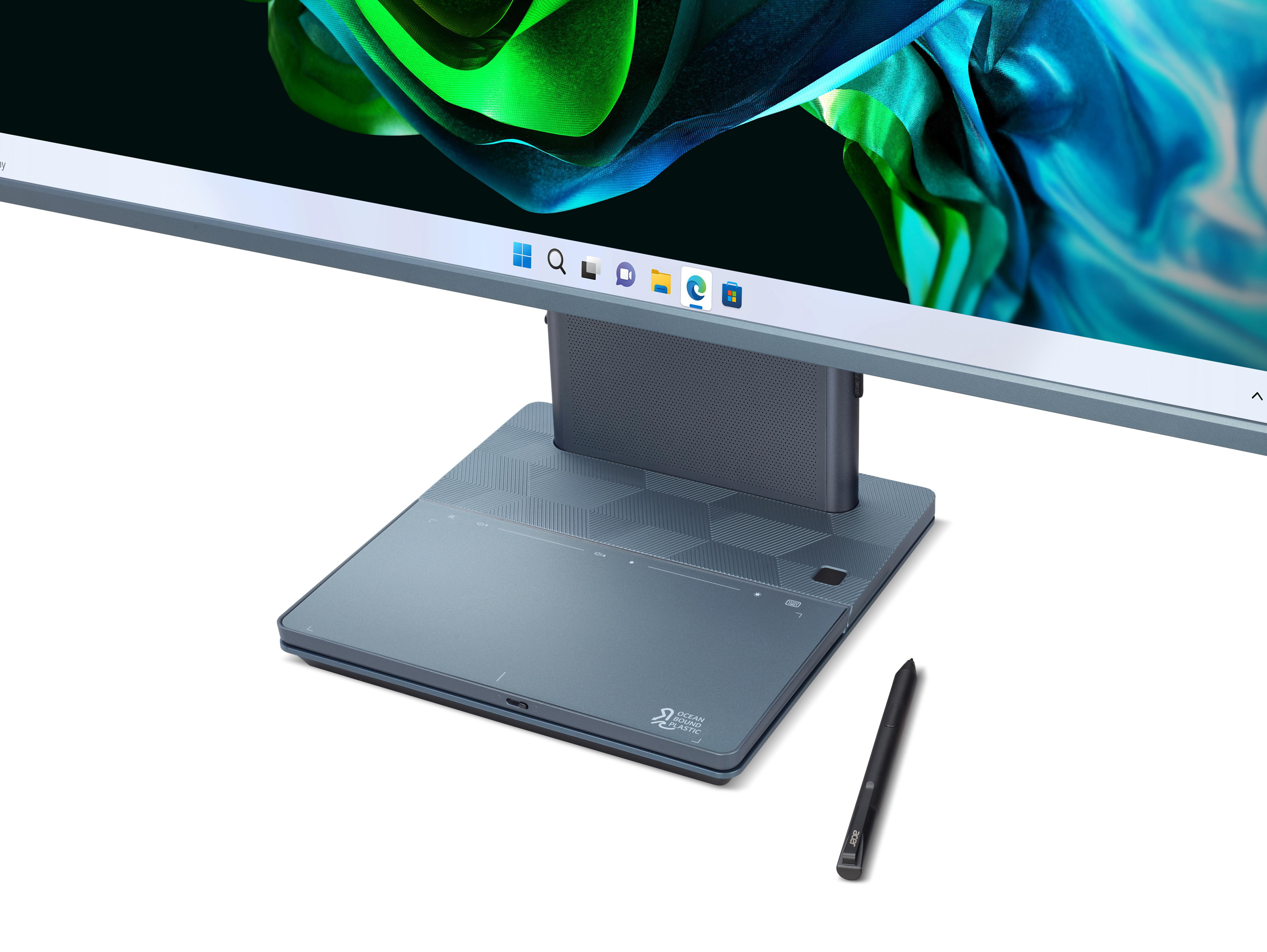 Ein Computer-Monitorfuß mit Stift und Stylus in einer Nahaufnahme.