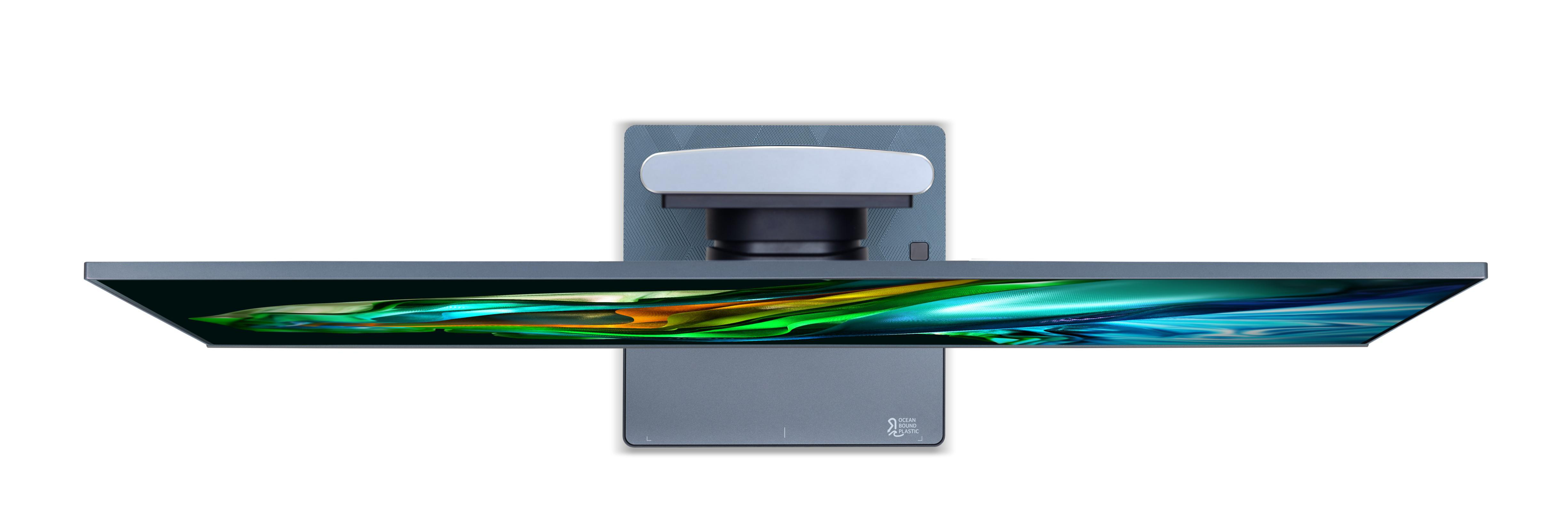 Draufsicht auf einen Monitor. Display ist eingeschaltet, Farben werden angezeigt.