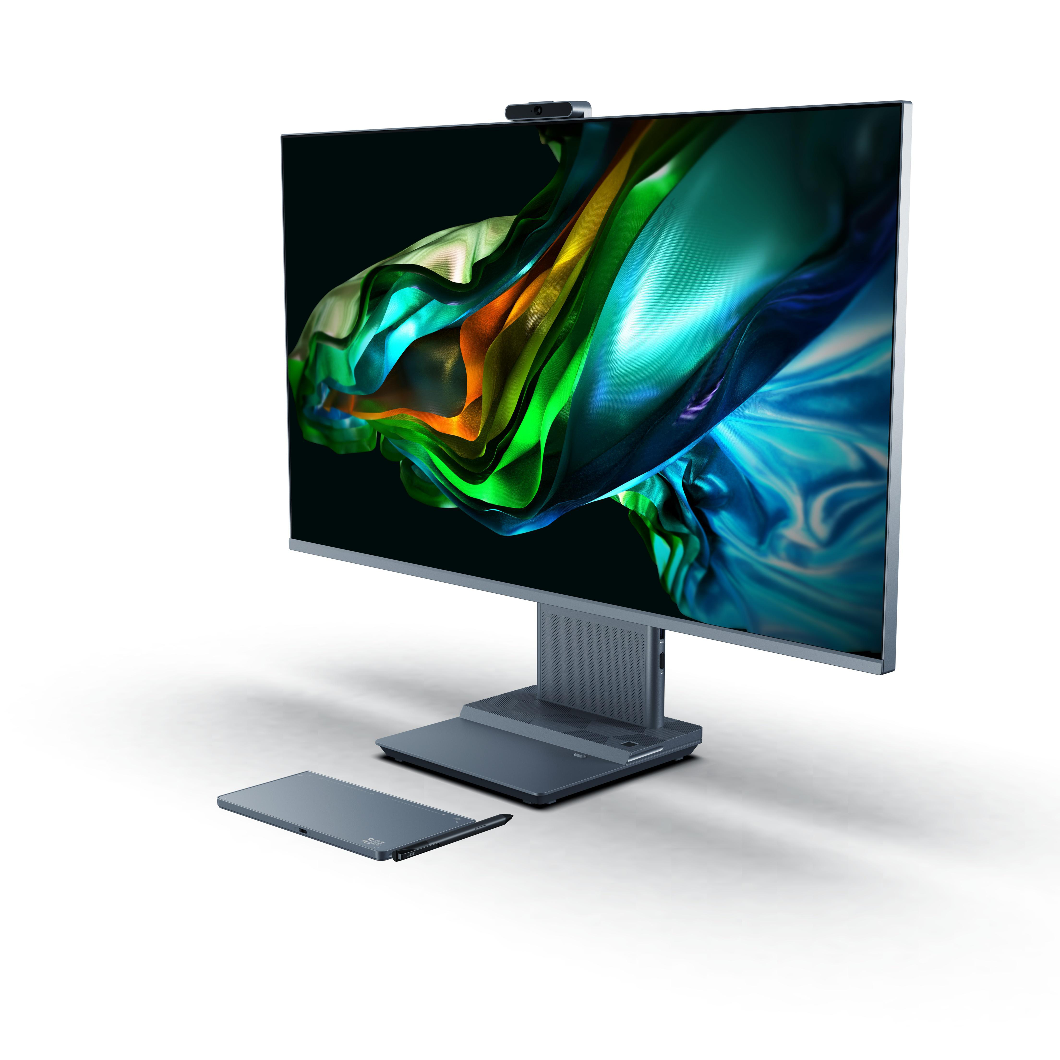 Ein großer Computermonitor mit Ständer und ein kleineres Gerät. Bunter, abstrakter Hintergrund.