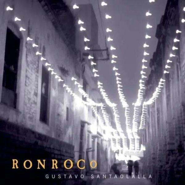 Album borító utcaképpel és füzérfényekkel, 'RONROCO' felirattal.