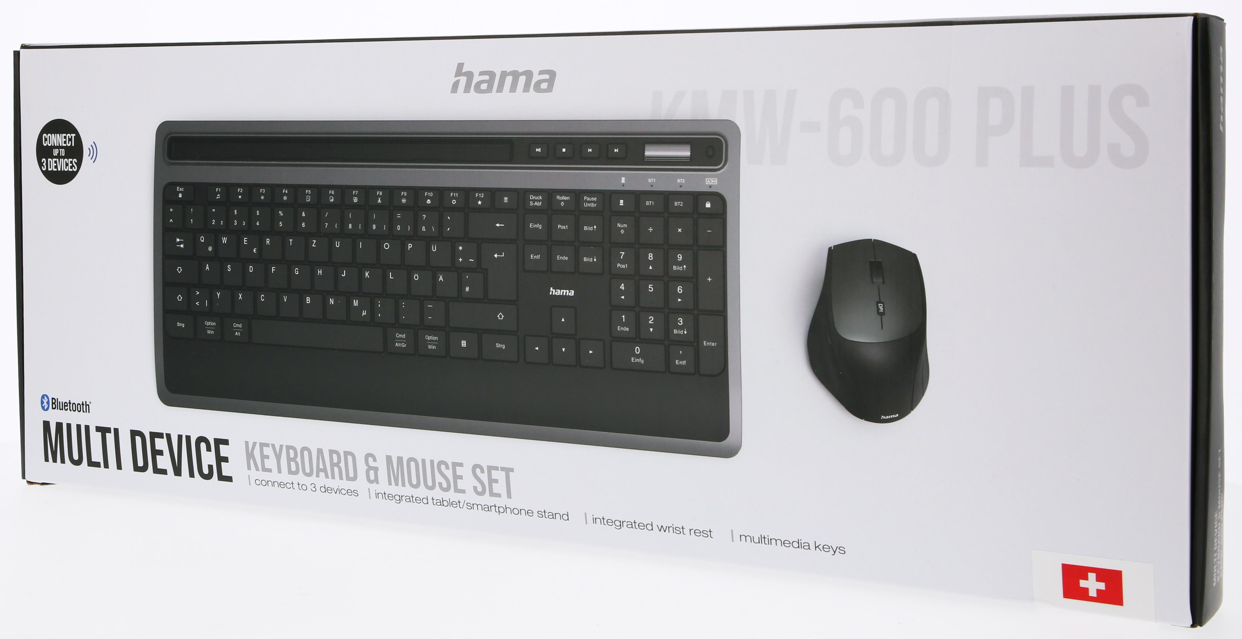Ensemble clavier et souris dans une boîte. Clavier et souris noirs sur fond blanc.