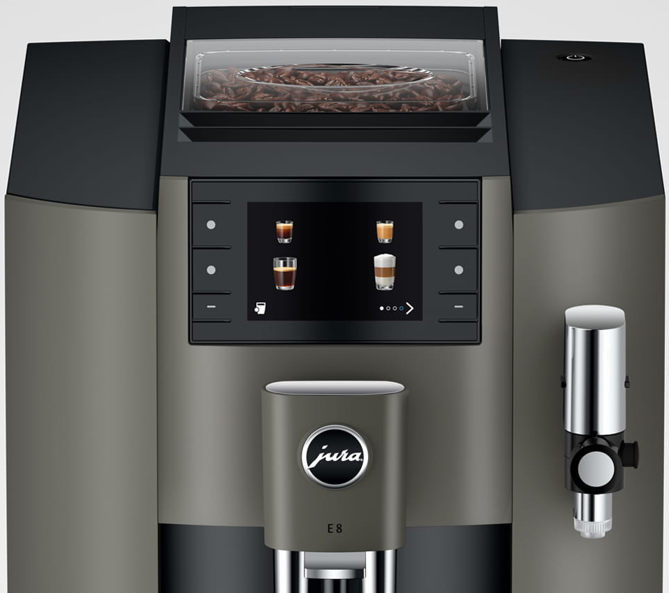 Una macchina da caffè Jura E8 grigia e nera. Ha un display e un montalatte.