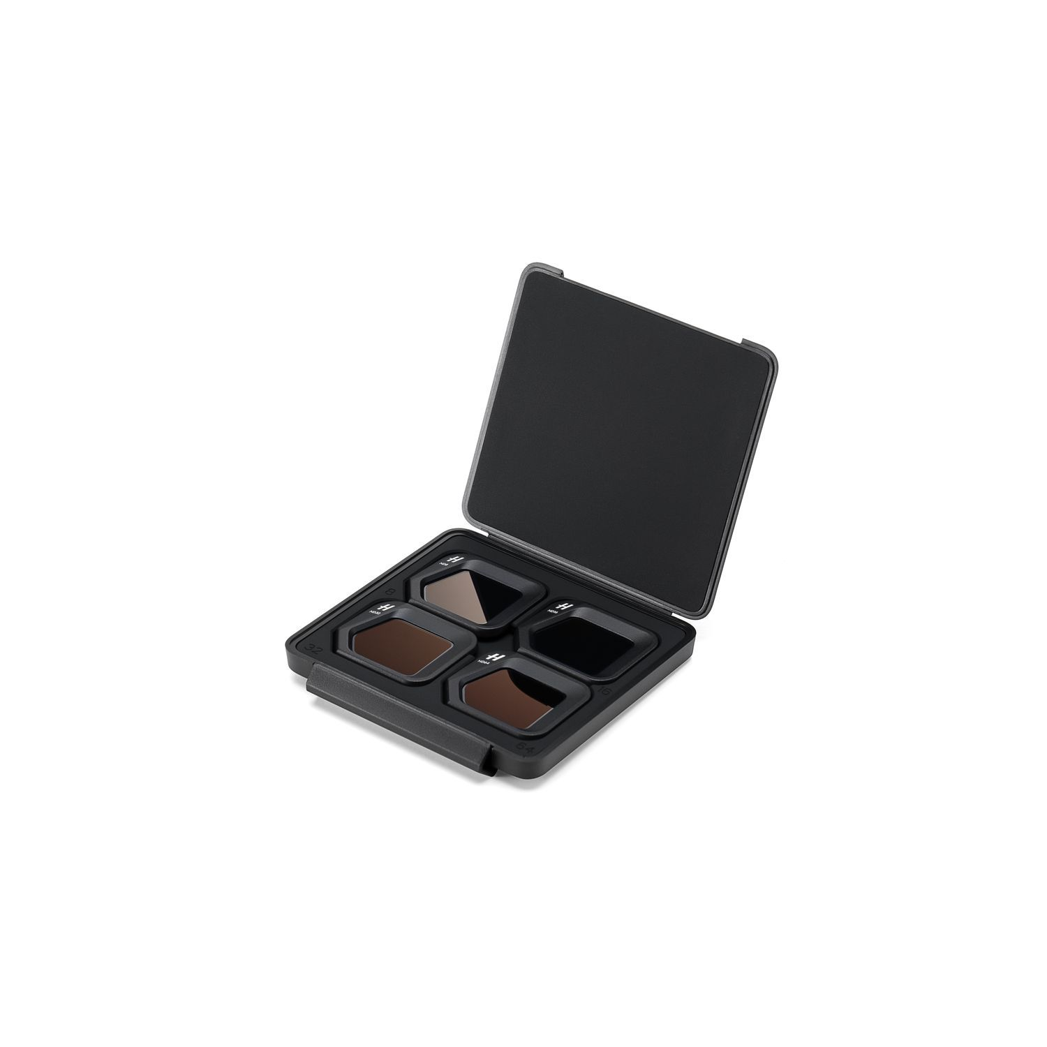 Open black case with four colored camera filters, arranged in a square.