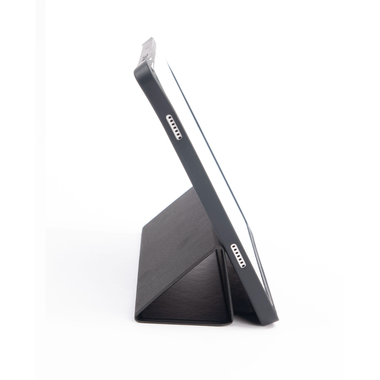 A tablet in a black case, propped up on a white surface.