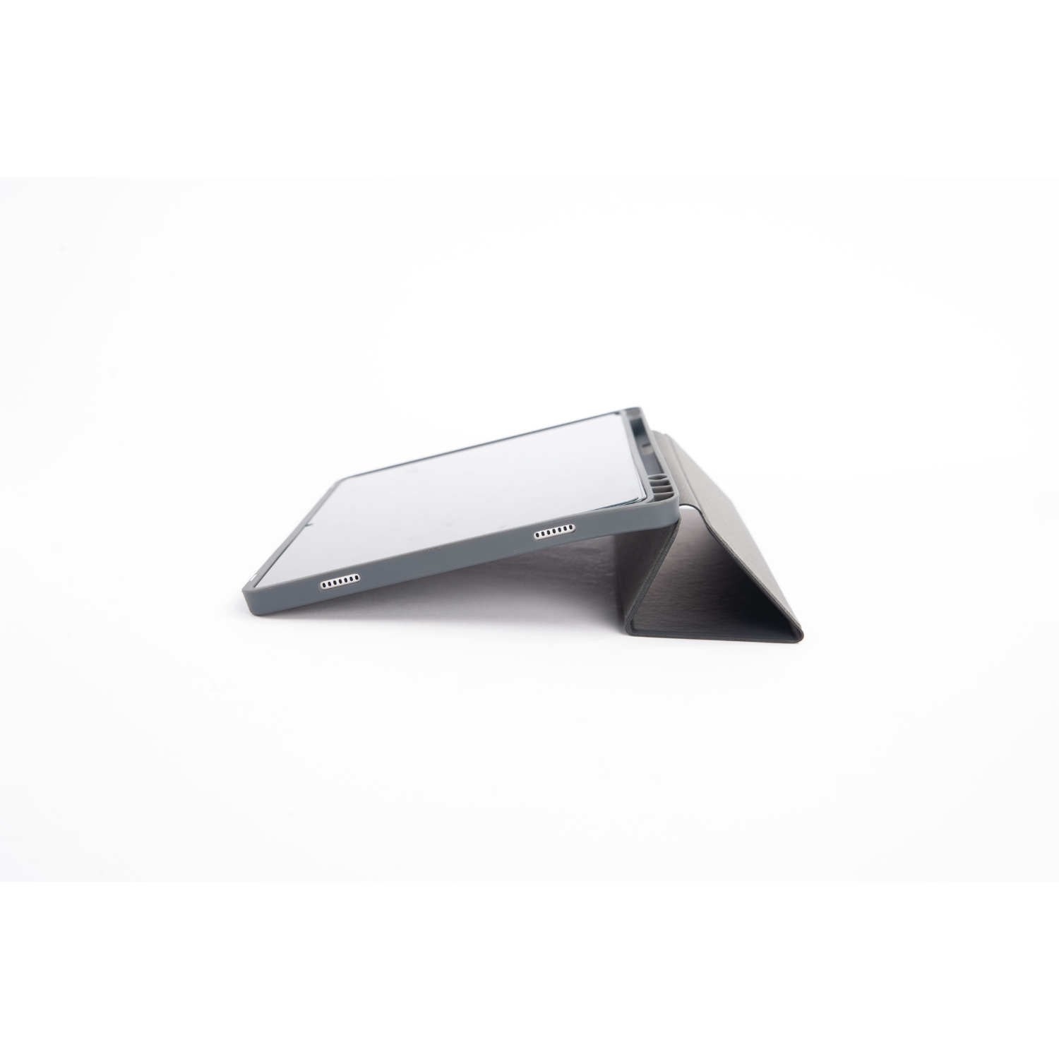 Tablet in a grey case, propped up. The case is black and the tablet is in an angle.