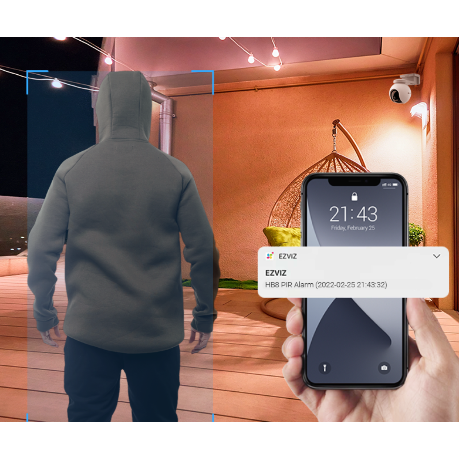 A person is alerted on a phone about a security breach, with a hooded figure in the background.