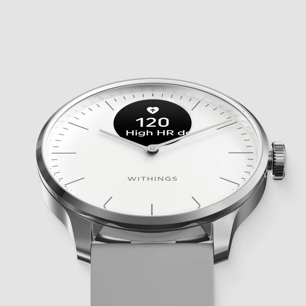 Egy ezüst Withings okosóra. A képernyő 120 bpm-et mutat, High HR detected.