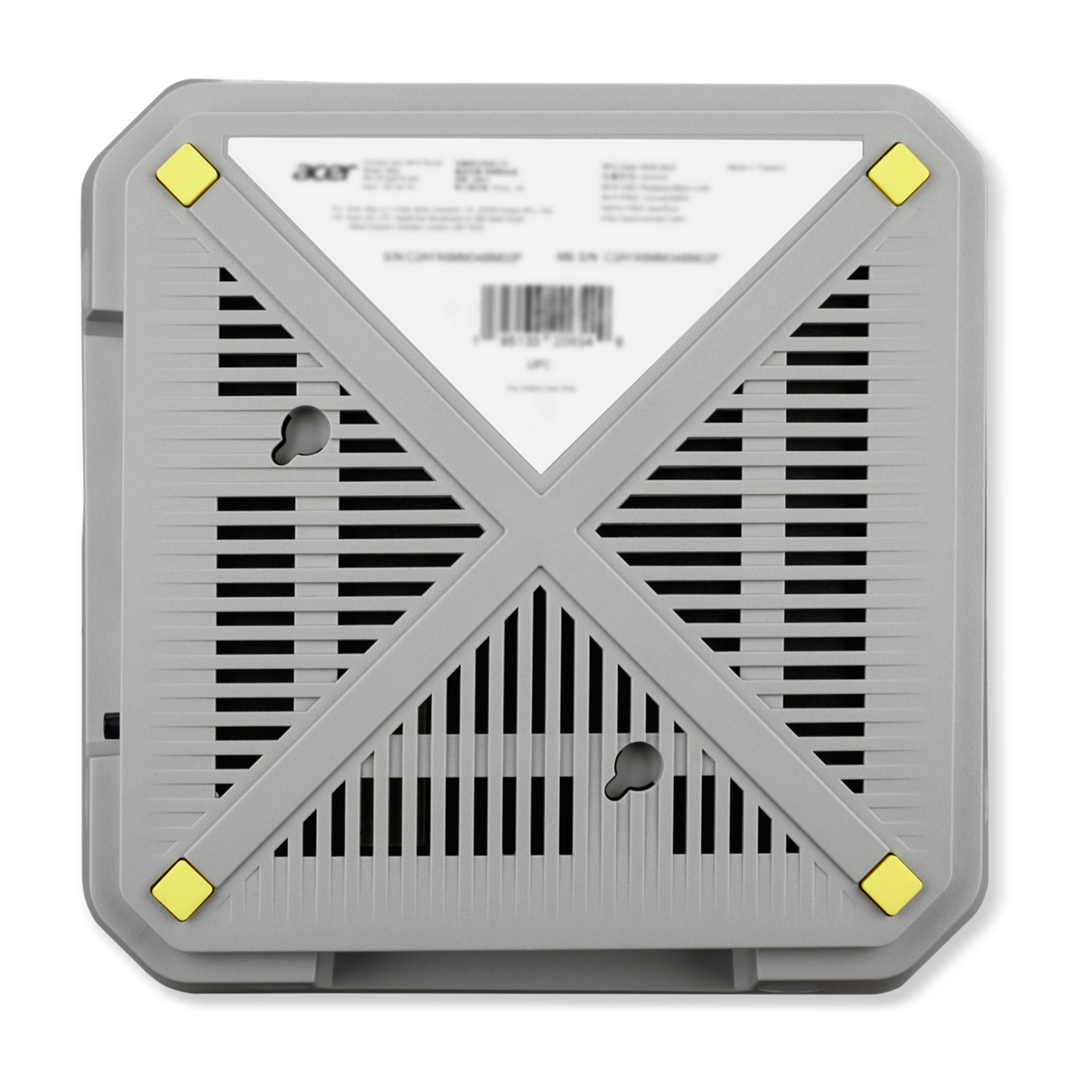 Vista inferiore del dispositivo Acer grigio. Ha fessure, un supporto a croce e cuscinetti gialli.