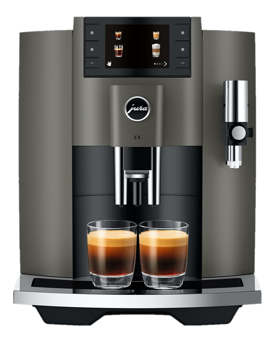 Una macchina da caffè Jura E8 grigio scuro con due bicchieri di caffè su una base nera.