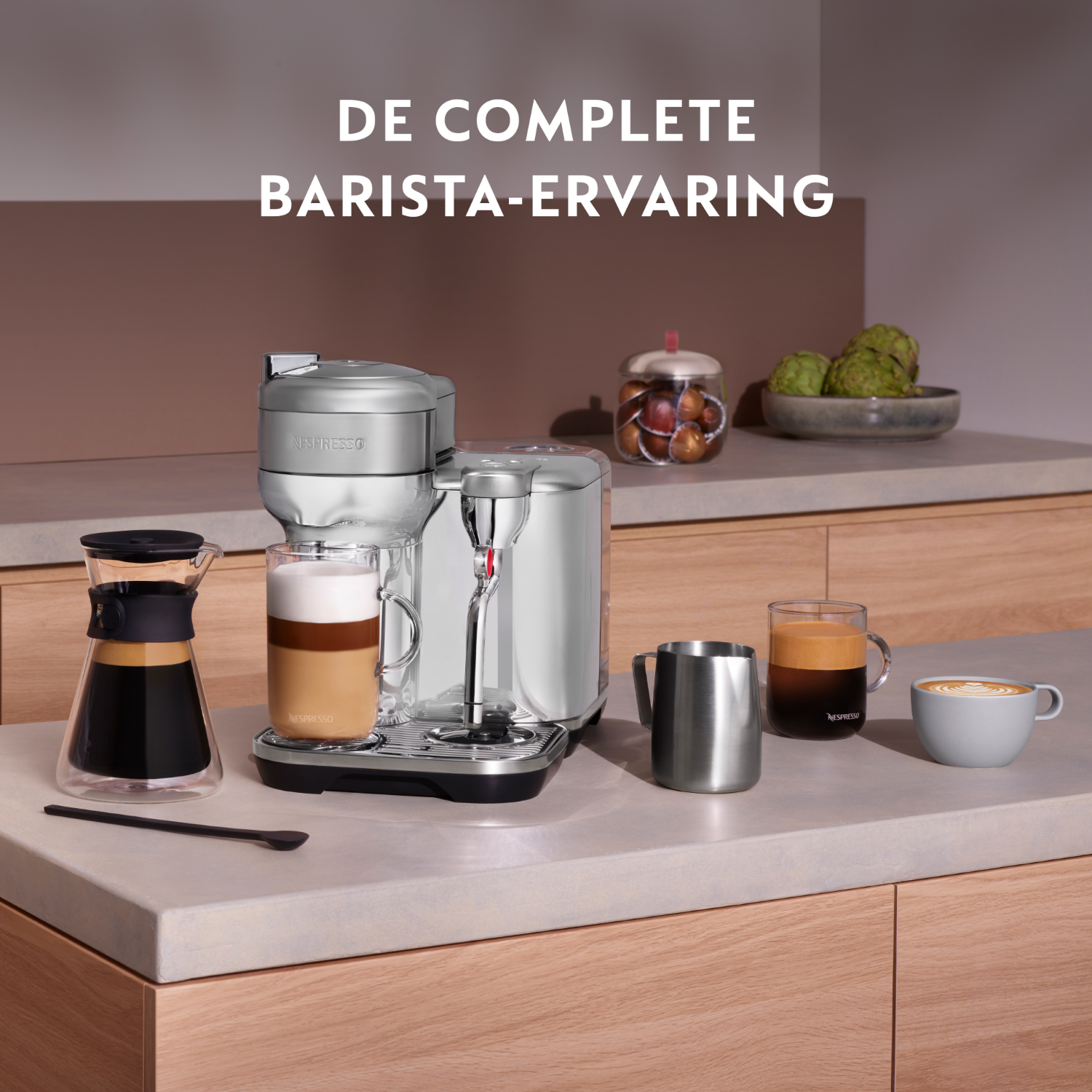 A Nespresso coffee machine with coffee and coffee accessories on a kitchen counter.