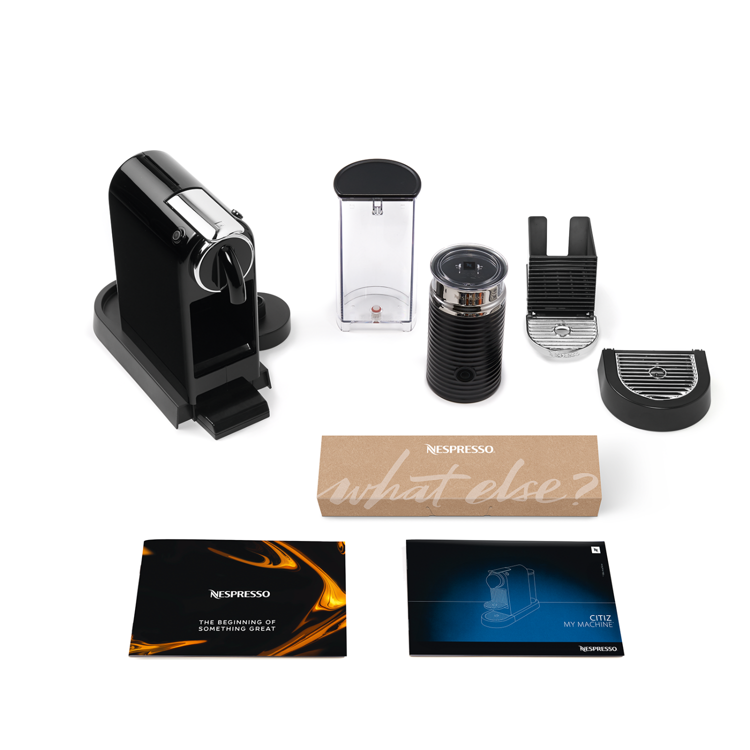 Black Nespresso coffee machine components. Black machine, water container, milk frother.