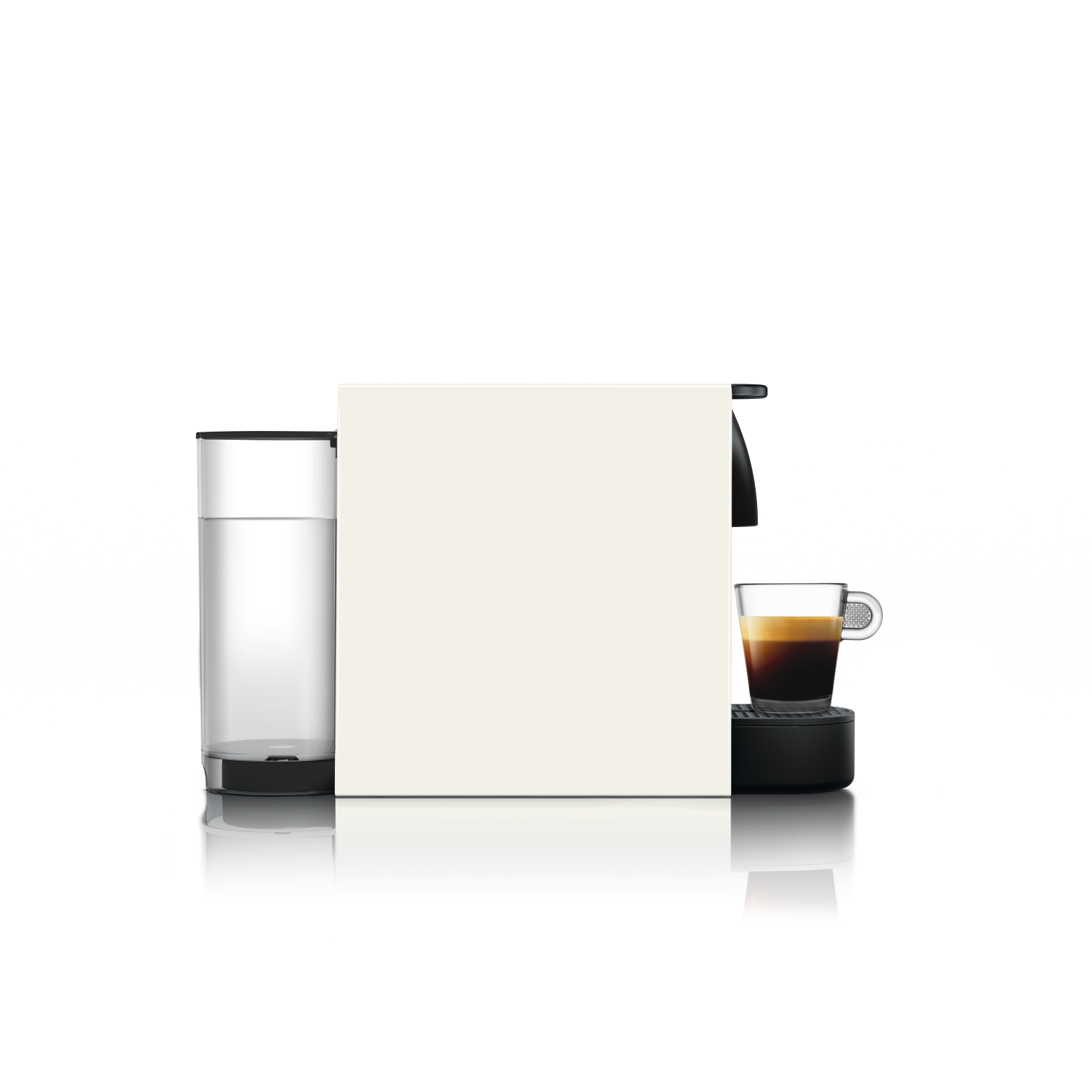 Black Nespresso machine with a glass of coffee. White background. Black surface.