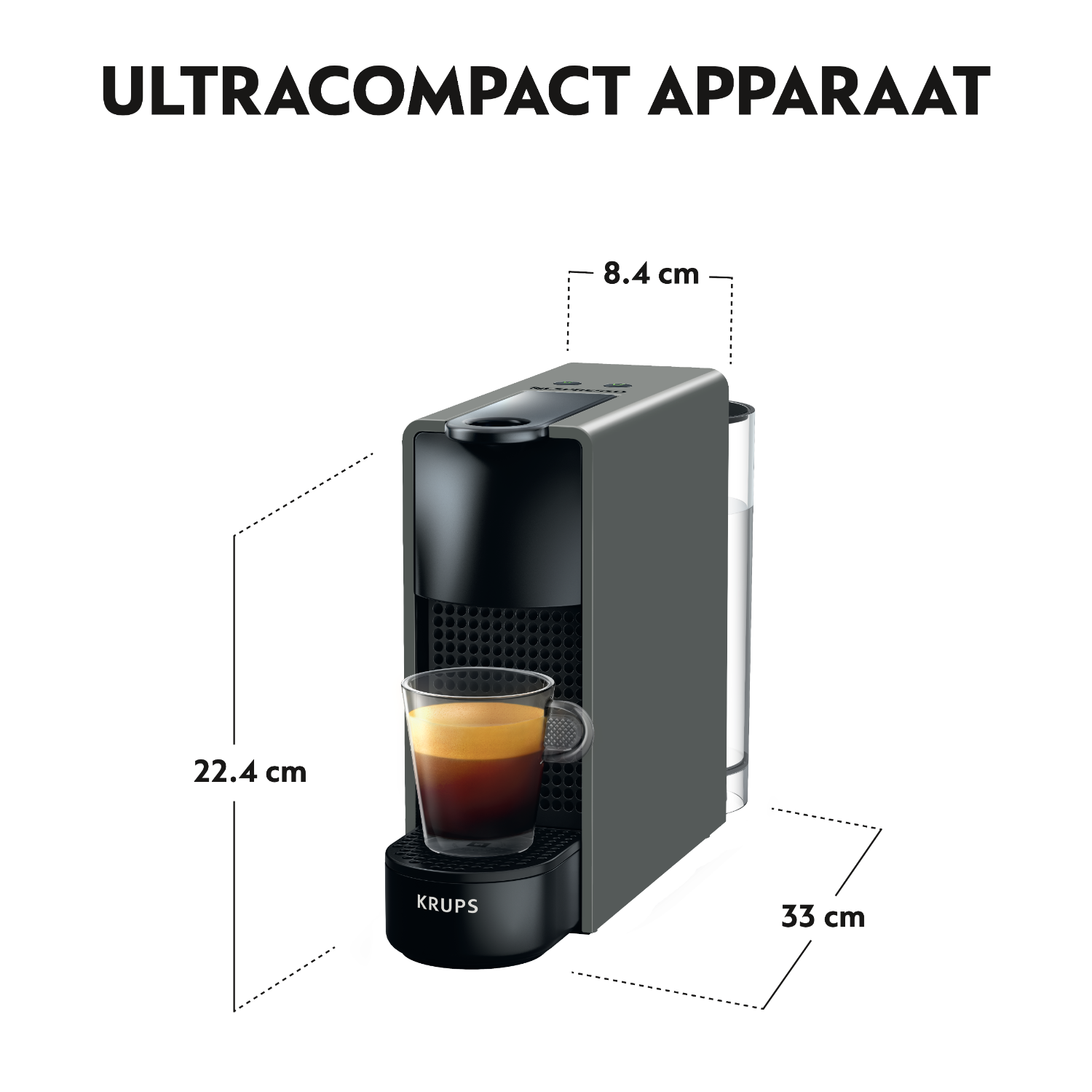 Dark gray espresso machine with a glass of coffee. Dimensions: 22.4cm tall, 33cm wide, 8.4cm depth.
