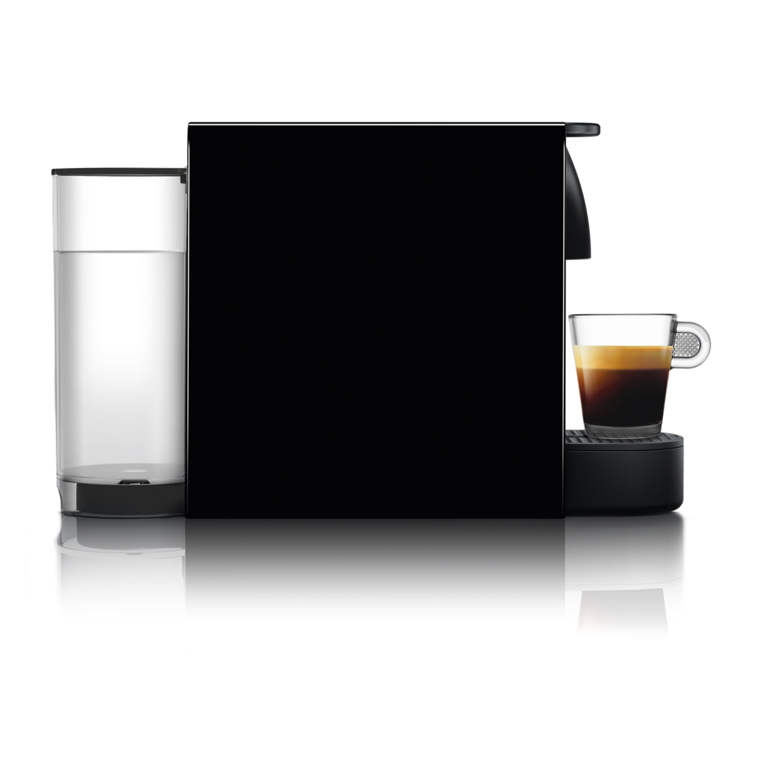 A black Nespresso machine with a water tank and a glass of espresso.