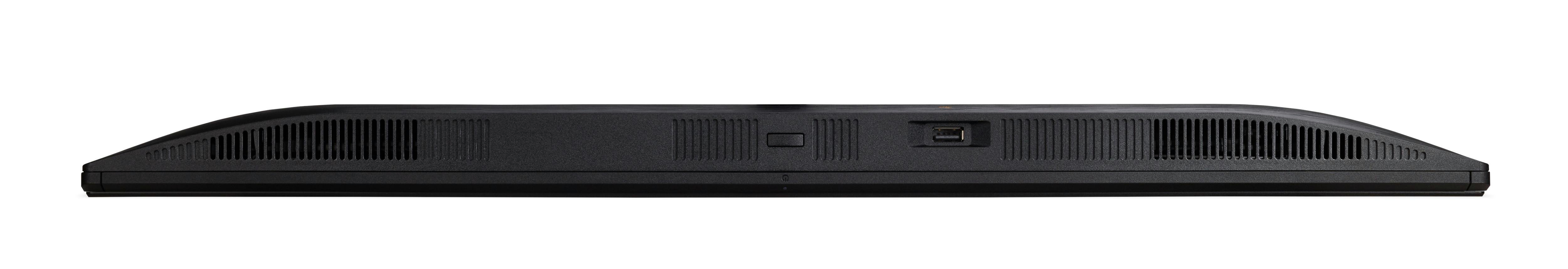 Die Rückseite eines schwarzen Monitors mit Lüftungsschlitzen und einem USB-Anschluss.