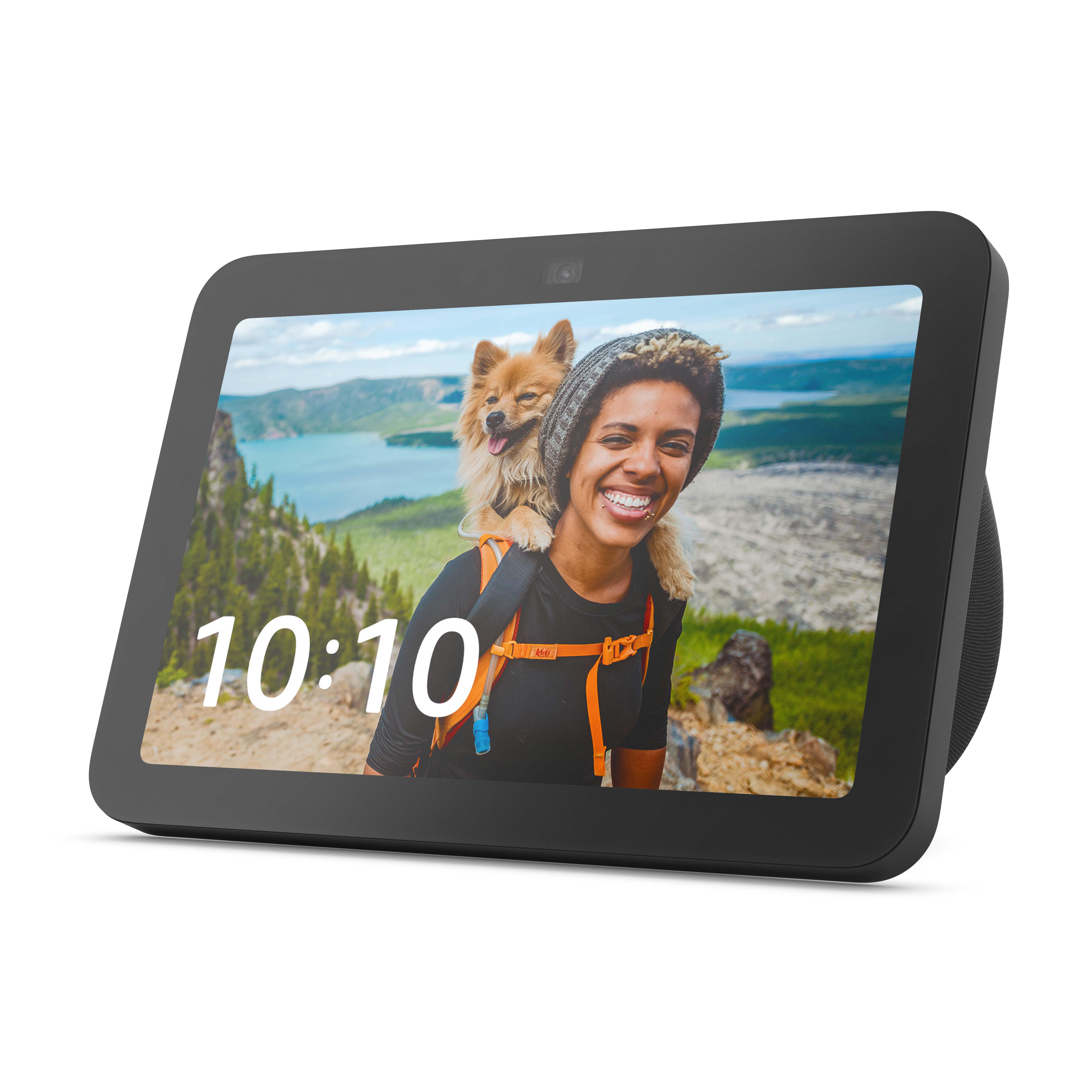 Ein schwarzes Smart Display zeigt eine Frau und einen Hund auf einem Berg mit der Uhrzeit 10:10.