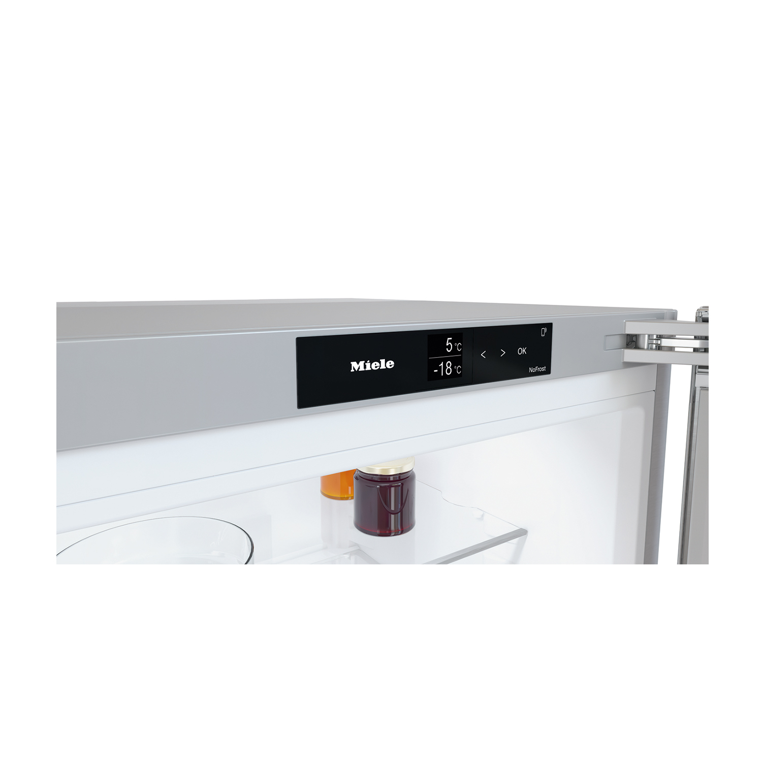 Primo piano del display interno del frigorifero Miele. Mostra le impostazioni della temperatura e il logo.