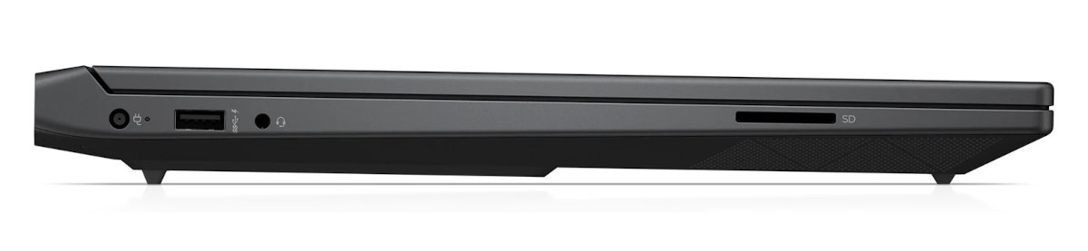 Widok z boku laptopa z portami, w tym kartą SD i gniazdem audio.