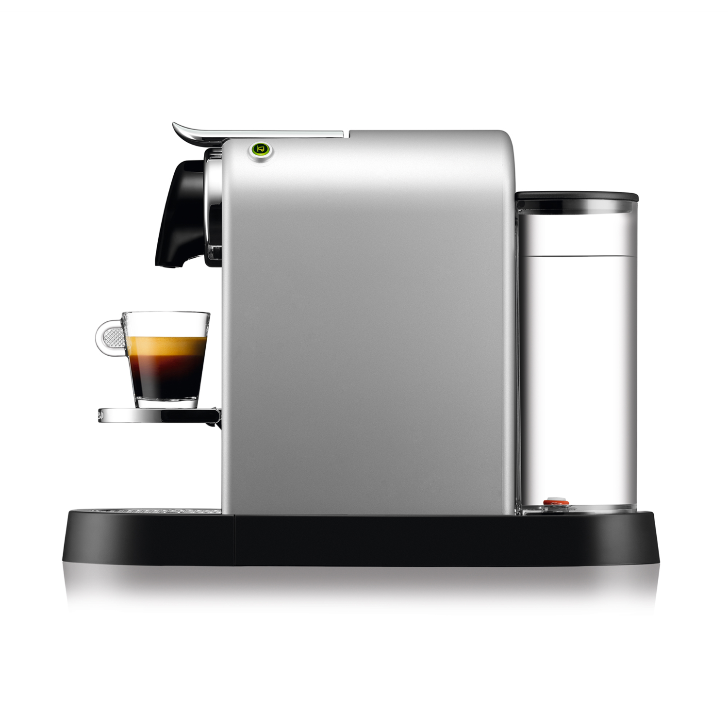 Silver Nespresso machine with a glass of coffee, and a water tank.