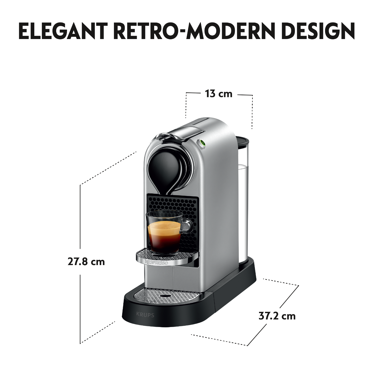 Silver espresso machine, black base, and a glass with coffee. Dimensions and the brand "KRUPS" are shown.