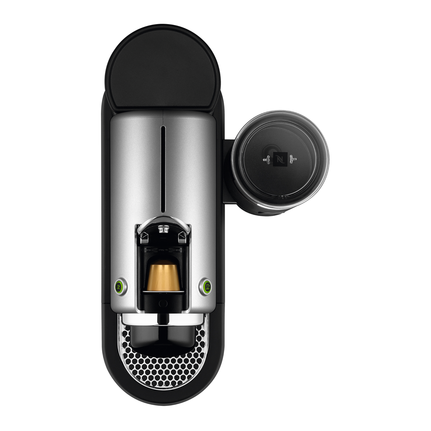 Nespresso coffee machine from above. Silver and black design. Coffee capsule inside.