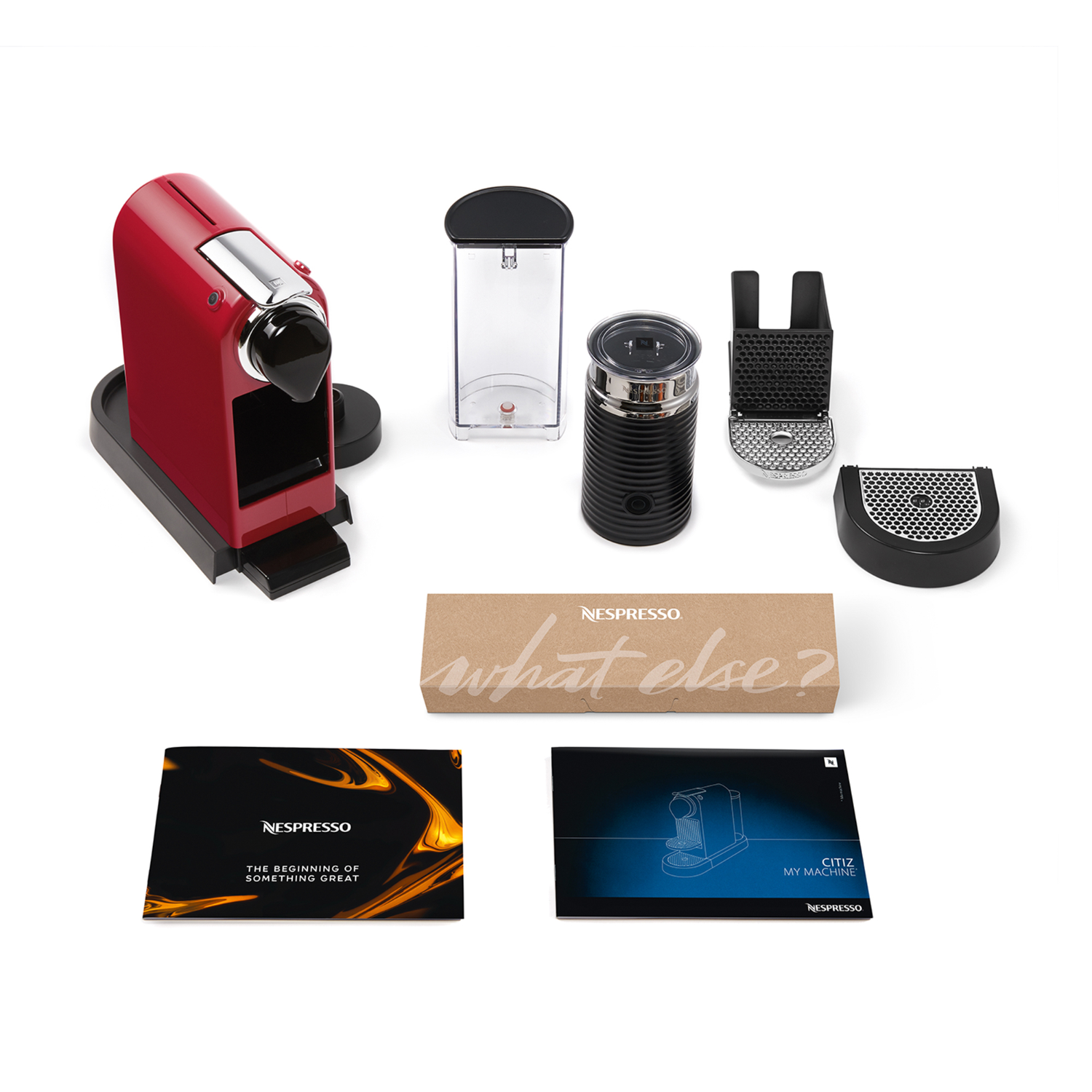 Nespresso Citiz coffee machine, red. Accessories including milk frother and coffee pods. White background.