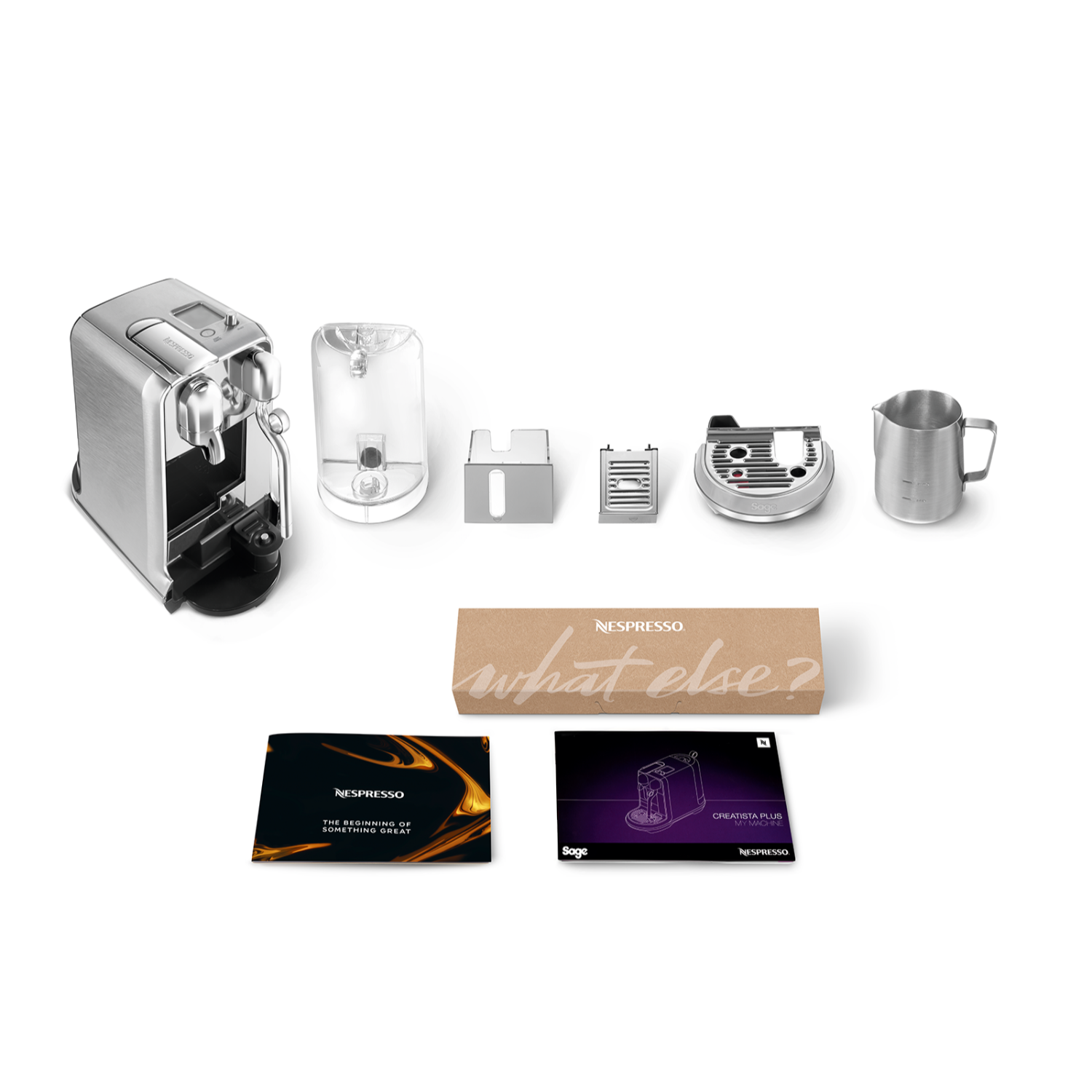 Nespresso-machine met accessoires, boekjes en doos.