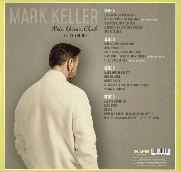 CD-Rückseite mit Titelliste, Text und Bild eines Mannes. Deluxe Edition.