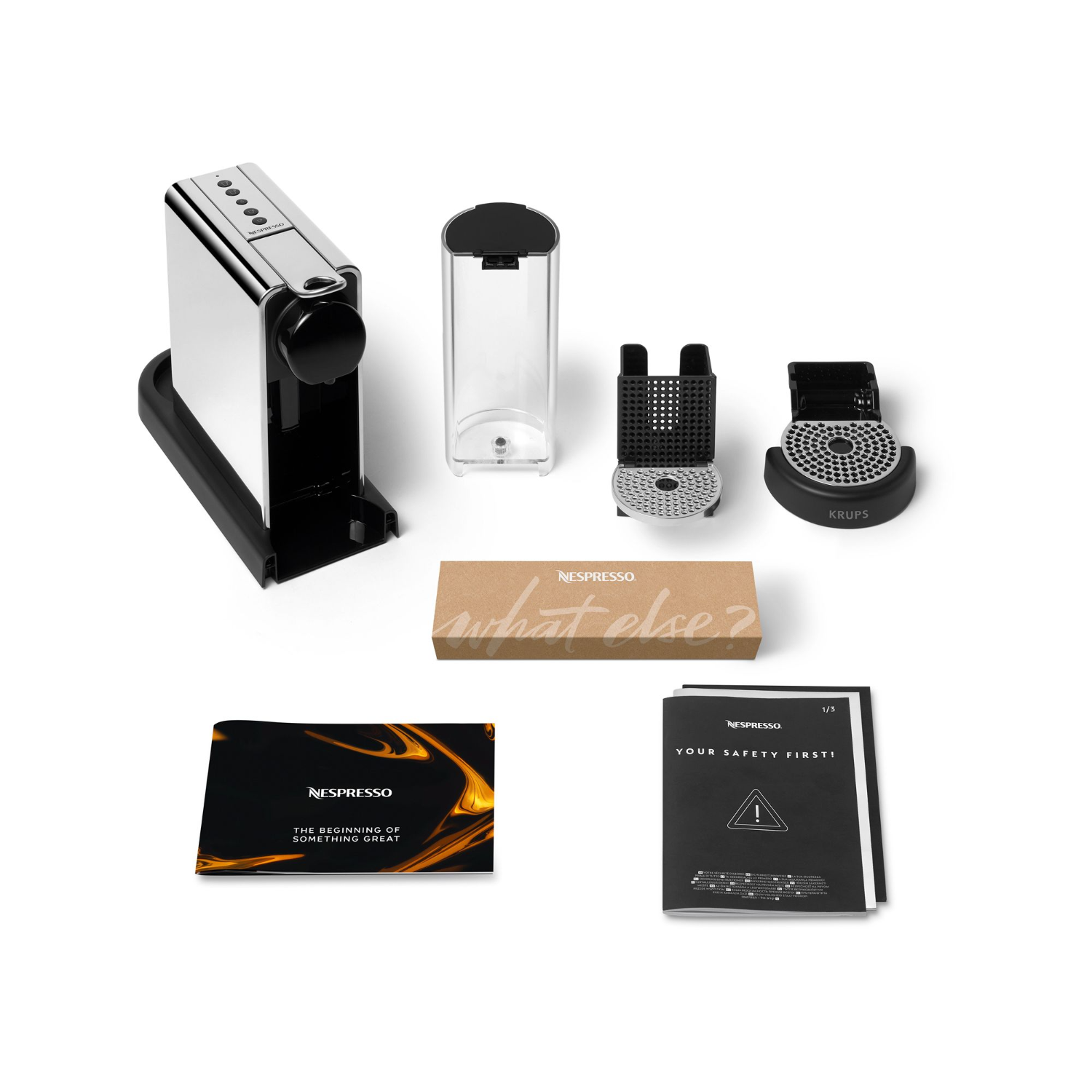 Various disassembled parts of a coffee machine, including a water container, a coffee machine body, and other components.