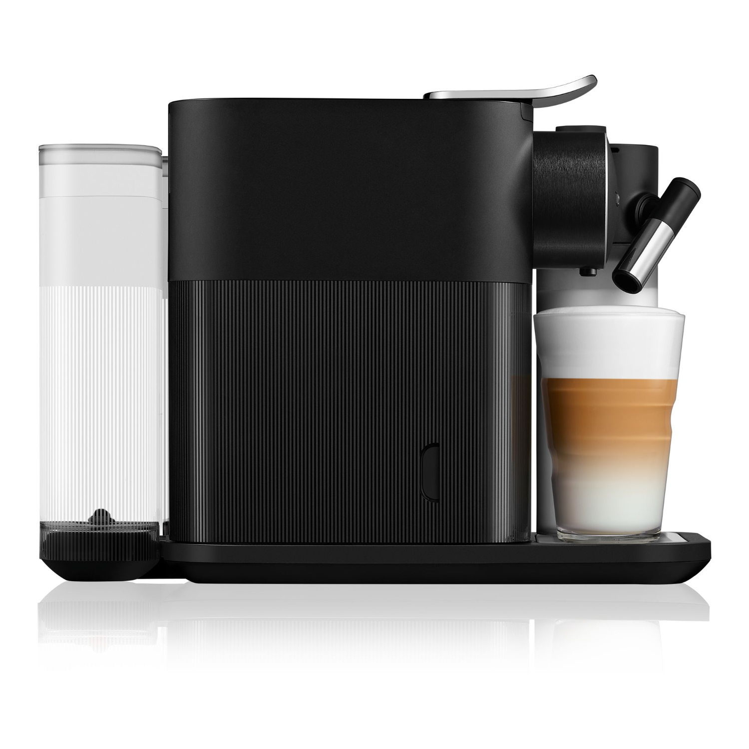 A black Nespresso machine with water tank and a latte macchiato.