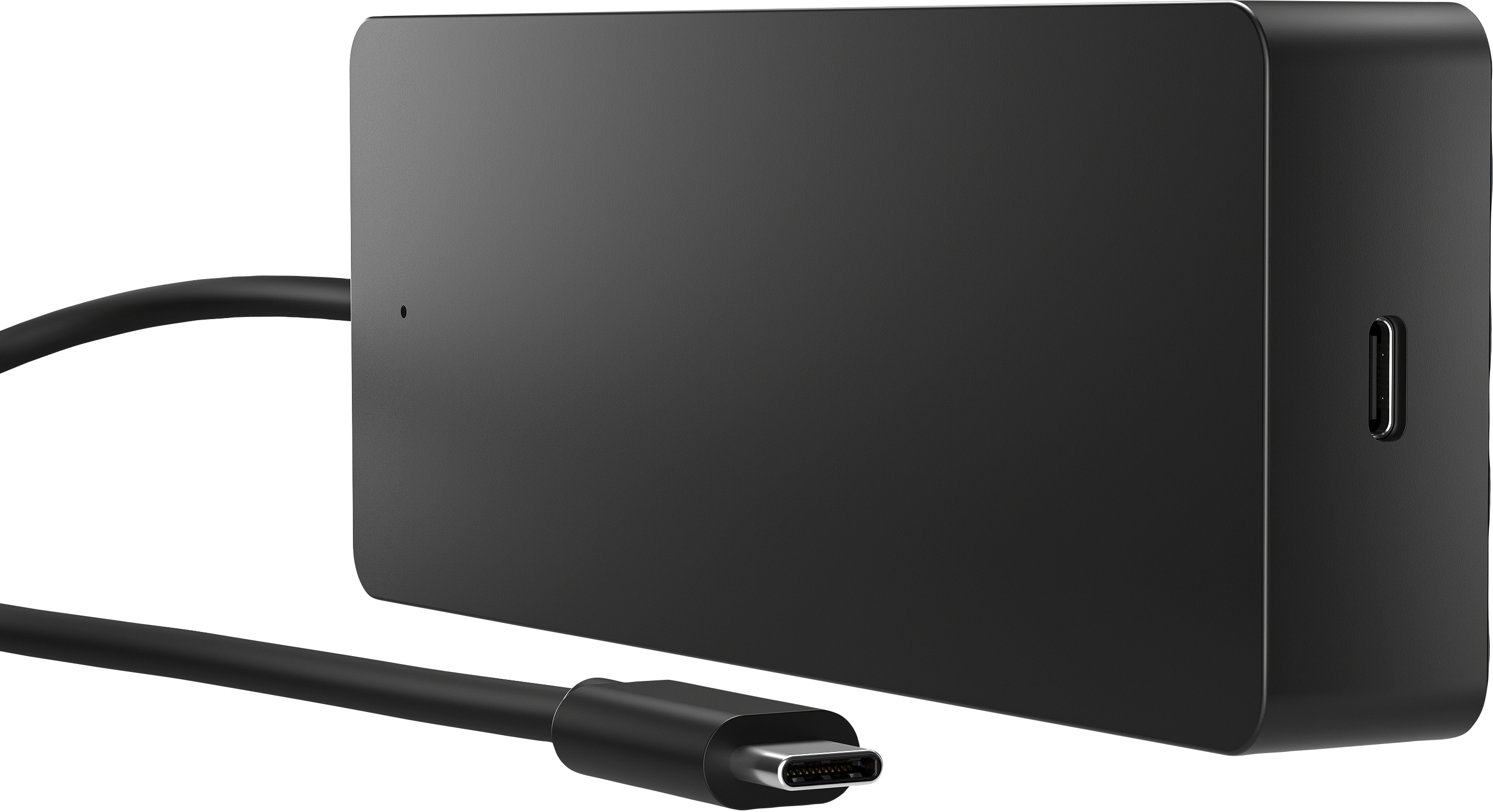 Station d'accueil Microsoft Surface noire avec un câble USB-C noir. La station a un port.