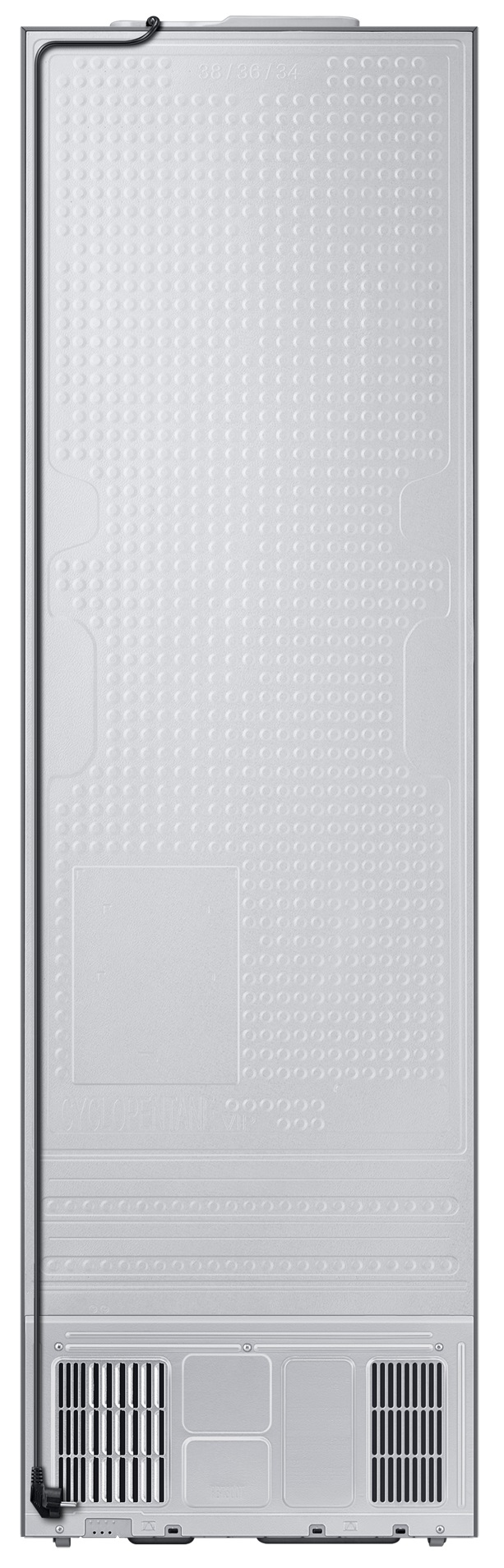 Tył srebrnej lodówki. Teksturowany wzór. Widoczne otwory wentylacyjne i przewód zasilający.