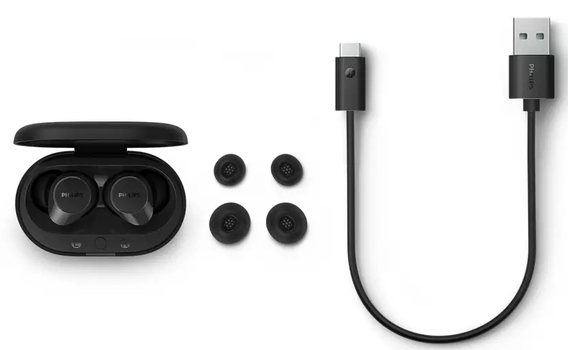 Słuchawki douszne w etui ładującym, z zapasowymi wkładkami dousznymi i kablem USB.