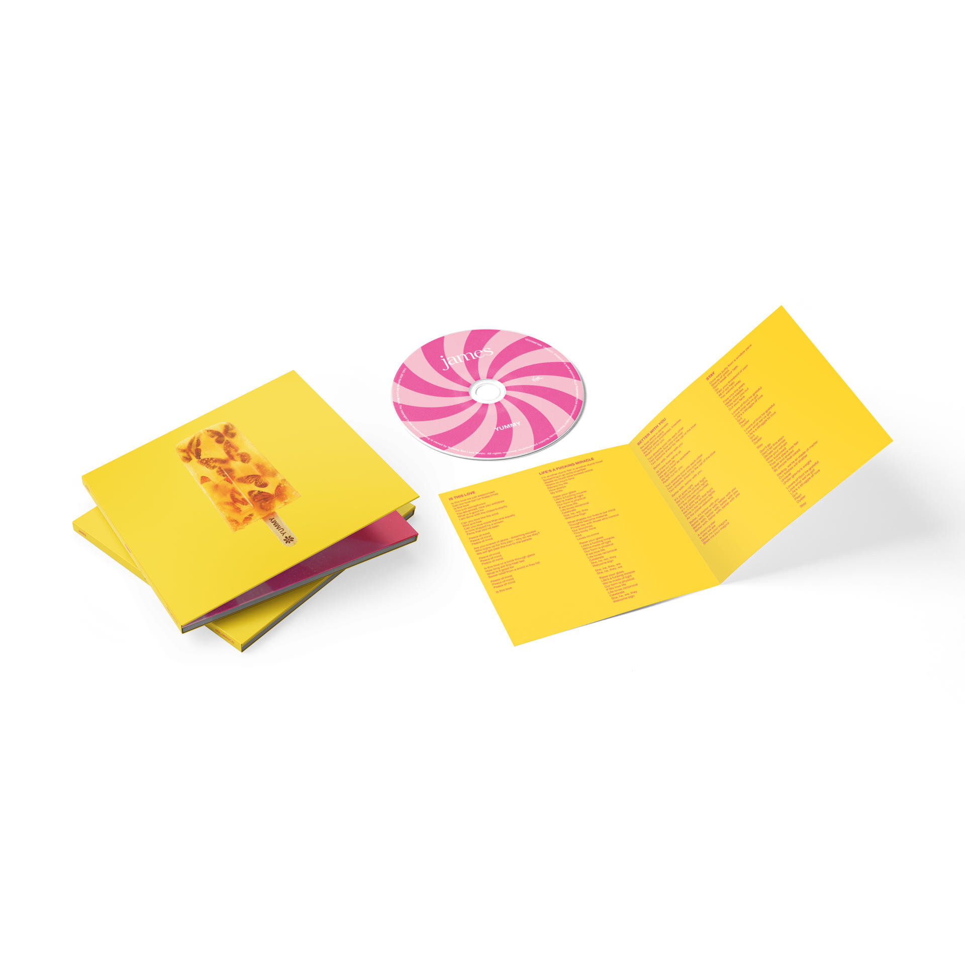CD-Album mit gelbem Cover und pinkfarbener Wirbel-CD, mit offenem Booklet auf weißem Hintergrund.