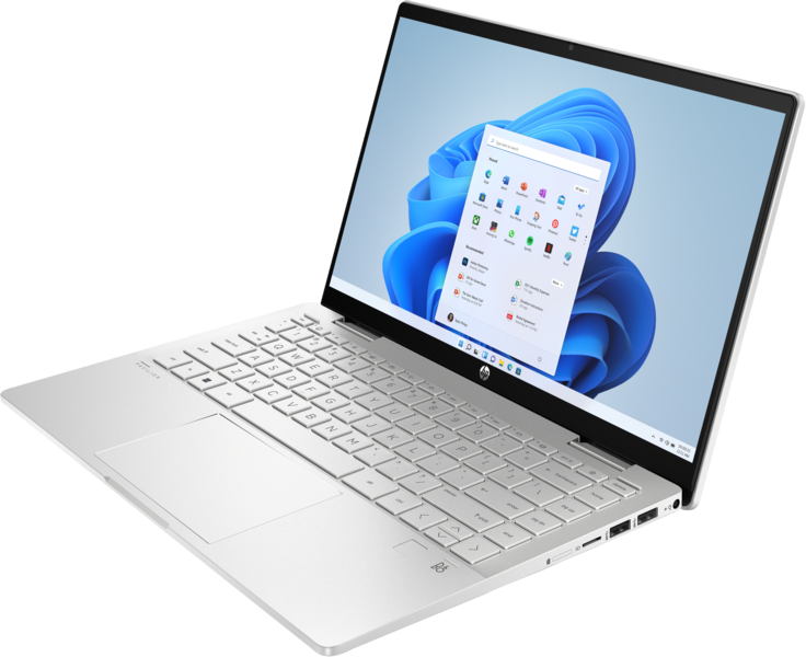 Ezüst laptop nyitott képernyővel, Windows asztallal, fehér háttér előtt.
